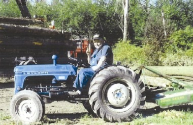 Tom aboard his Lyland tractor, once owned by his father