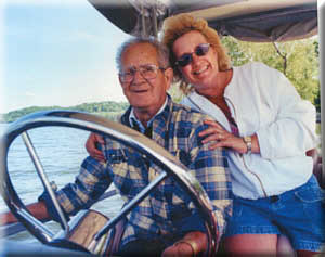 Walter and one of his daughters, Donna Smith, aboard his beloved boat