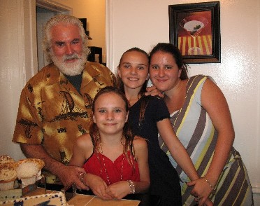 John McNamara with his daughters, from left to right, Shannon (age 12), Katherine Claire (age 11) and Nicollette (age 21). September 10, 2007