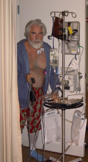 John walking the halls of UCLA Medical Center after undergoing a pleurectomy with decortication. November 2005.